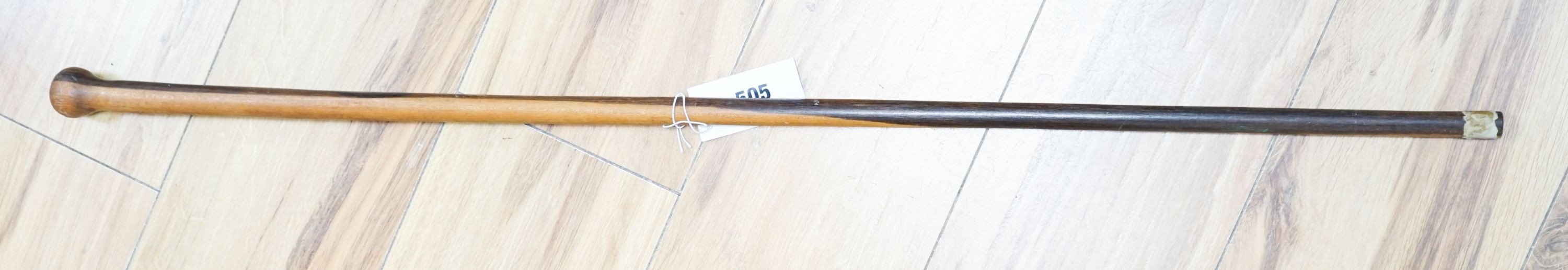 An ebony walking cane